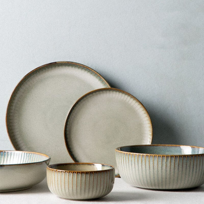 Household Nordic Tableware set featuring ceramic rice bowl, noodle bowl, flat plates, and salad bowl in brown.