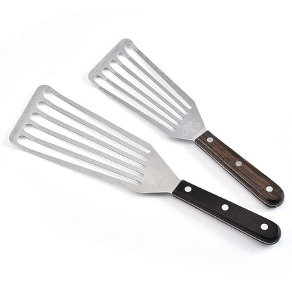 Stainless steel multi-purpose spatula with wooden handle for kitchen use.