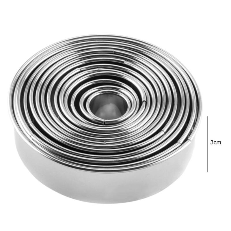 Round stainless steel cake mold set of 14 pieces in various sizes.