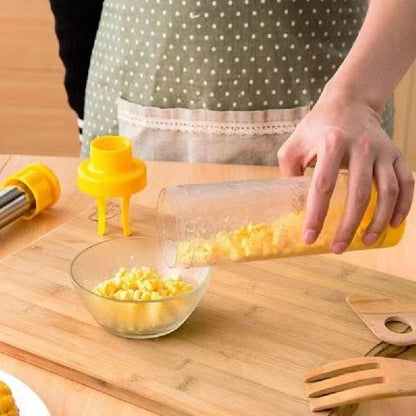 Yellow corn stripper in use on wooden board, modern design.