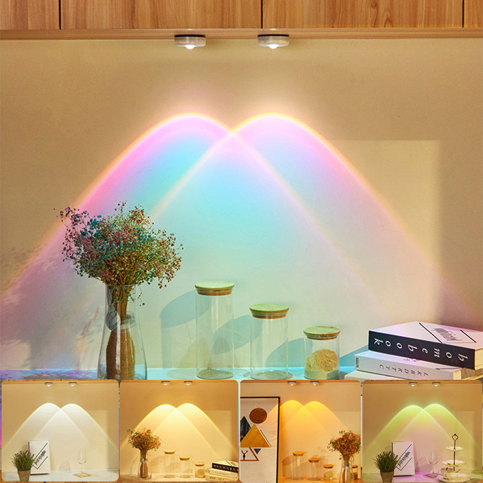 Wireless LED lights under furniture in a kitchen setting, emitting colorful sunset effects on the wall.